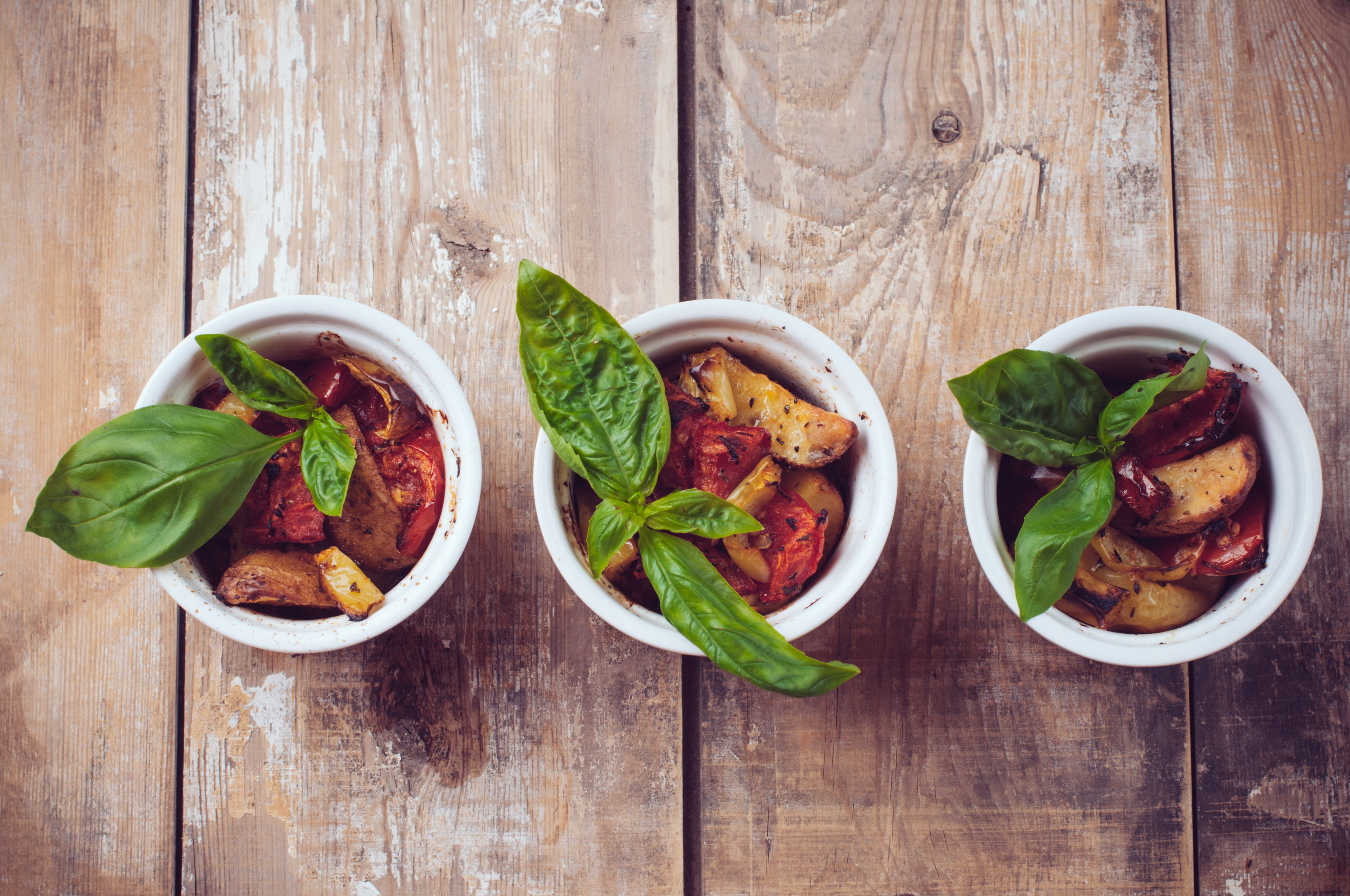 Three dishes of vegan food