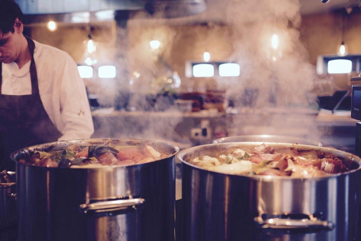 Chefs Preparing food in a commercial kitchen