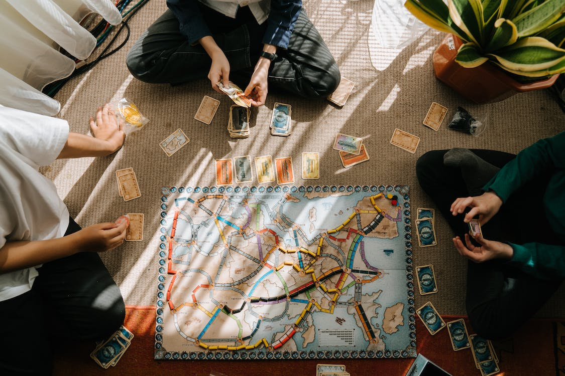 Group of people playing a board game